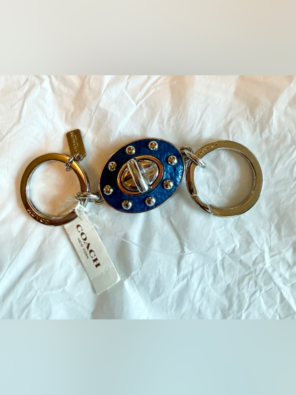 COACH Silver Oval Turnlock Keyring